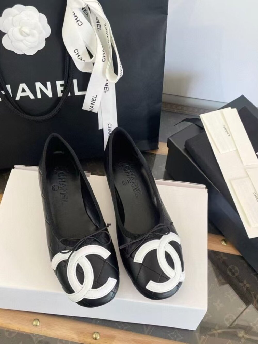 Chanel Quilted Lambskin Round‑Toe Two‑Tone Bow Slip‑On Flats